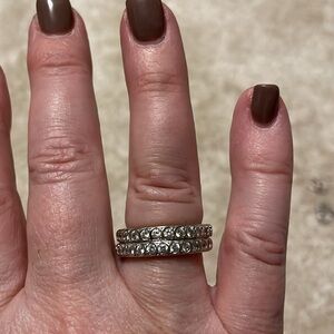 Lot of 2 stackable sterling silver and white zircon eternity band rings